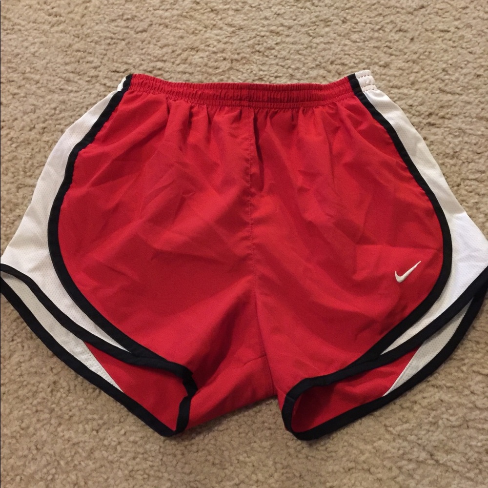Red Nike shorts